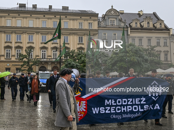 KRAKOW, POLAND - OCTOBER 5:
Members of the All-Polish Youth (Polish: Mlodziez Wszechpolska), a far-right ultranationalist youth organization...