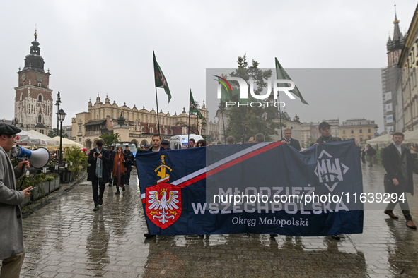 KRAKOW, POLAND - OCTOBER 5:
Members of the All-Polish Youth (Polish: Mlodziez Wszechpolska), a far-right ultranationalist youth organization...