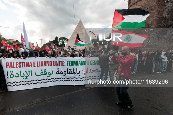 People from some Palestinian associations in Italy participate in a national pro-Palestine demonstration in Rome, Italy, on October 5, 2024,...