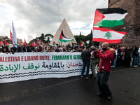 People from some Palestinian associations in Italy participate in a national pro-Palestine demonstration in Rome, Italy, on October 5, 2024,...