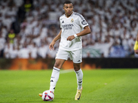 Kylian Mbappe of Real Madrid CF is in action with the ball during the La Liga EA Sports 2024/25 football match between Real Madrid CF and Vi...