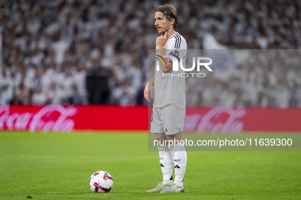 Luka Modric of Real Madrid CF is in action with the ball during the La Liga EA Sports 2024/25 football match between Real Madrid CF and Vill...