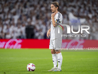 Luka Modric of Real Madrid CF is in action with the ball during the La Liga EA Sports 2024/25 football match between Real Madrid CF and Vill...