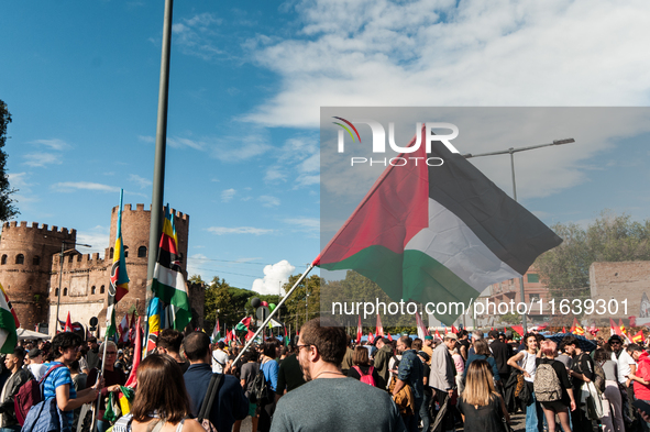 People from some Palestinian associations in Italy participate in a national pro-Palestine demonstration in Rome, Italy, on October 5, 2024,...