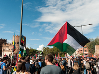 People from some Palestinian associations in Italy participate in a national pro-Palestine demonstration in Rome, Italy, on October 5, 2024,...