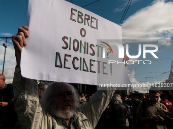 People from some Palestinian associations in Italy participate in a national pro-Palestine demonstration in Rome, Italy, on October 5, 2024,...