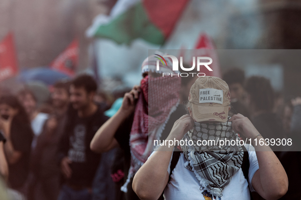 People from some Palestinian associations in Italy participate in a national pro-Palestine demonstration in Rome, Italy, on October 5, 2024,...