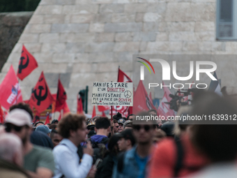 People from some Palestinian associations in Italy participate in a national pro-Palestine demonstration in Rome, Italy, on October 5, 2024,...