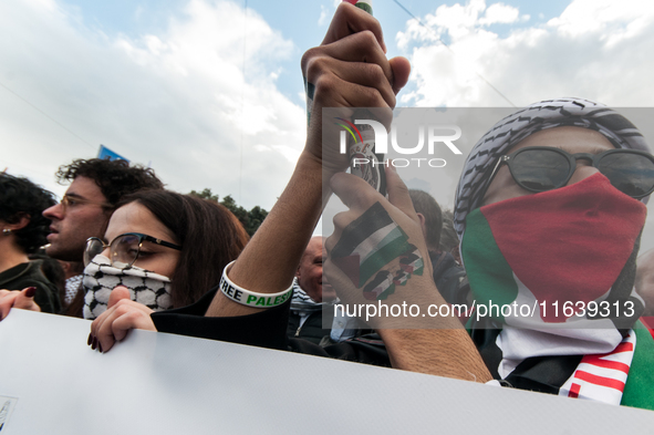 People from some Palestinian associations in Italy participate in a national pro-Palestine demonstration in Rome, Italy, on October 5, 2024,...