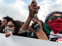 People from some Palestinian associations in Italy participate in a national pro-Palestine demonstration in Rome, Italy, on October 5, 2024,...