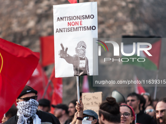 People from some Palestinian associations in Italy participate in a national pro-Palestine demonstration in Rome, Italy, on October 5, 2024,...