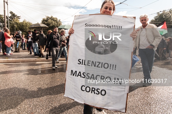 People from some Palestinian associations in Italy participate in a national pro-Palestine demonstration in Rome, Italy, on October 5, 2024,...