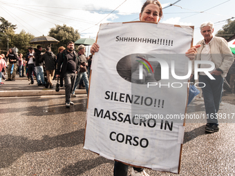 People from some Palestinian associations in Italy participate in a national pro-Palestine demonstration in Rome, Italy, on October 5, 2024,...