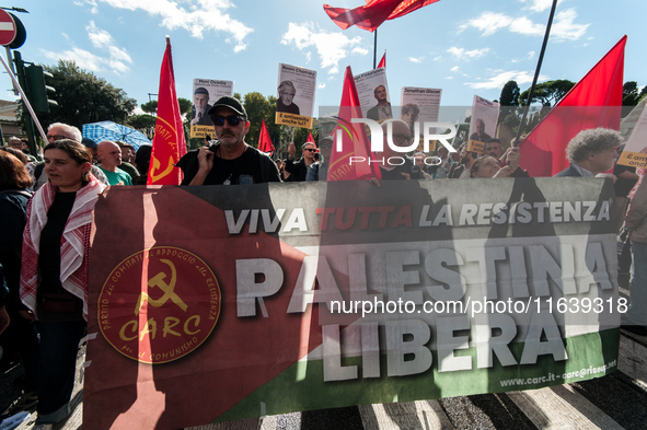 People from some Palestinian associations in Italy participate in a national pro-Palestine demonstration in Rome, Italy, on October 5, 2024,...