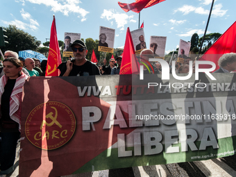 People from some Palestinian associations in Italy participate in a national pro-Palestine demonstration in Rome, Italy, on October 5, 2024,...