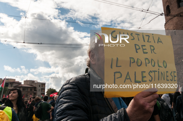 People from some Palestinian associations in Italy participate in a national pro-Palestine demonstration in Rome, Italy, on October 5, 2024,...