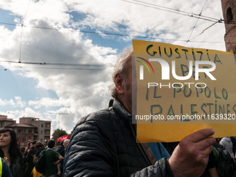 People from some Palestinian associations in Italy participate in a national pro-Palestine demonstration in Rome, Italy, on October 5, 2024,...