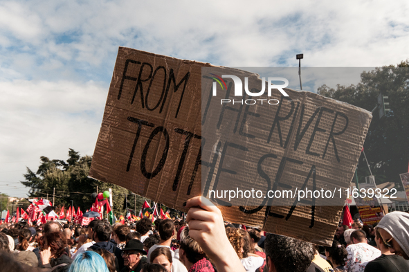 People from some Palestinian associations in Italy participate in a national pro-Palestine demonstration in Rome, Italy, on October 5, 2024,...