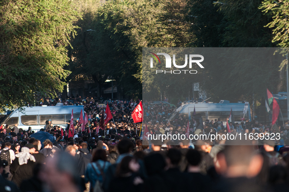 People from some Palestinian associations in Italy participate in a national pro-Palestine demonstration in Rome, Italy, on October 5, 2024,...