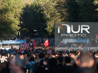 People from some Palestinian associations in Italy participate in a national pro-Palestine demonstration in Rome, Italy, on October 5, 2024,...