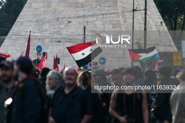 People from some Palestinian associations in Italy participate in a national pro-Palestine demonstration in Rome, Italy, on October 5, 2024,...