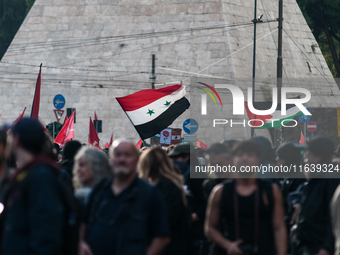 People from some Palestinian associations in Italy participate in a national pro-Palestine demonstration in Rome, Italy, on October 5, 2024,...