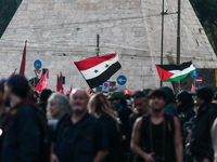 People from some Palestinian associations in Italy participate in a national pro-Palestine demonstration in Rome, Italy, on October 5, 2024,...