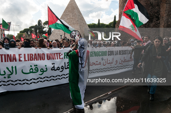 People from some Palestinian associations in Italy participate in a national pro-Palestine demonstration in Rome, Italy, on October 5, 2024,...