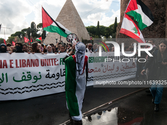 People from some Palestinian associations in Italy participate in a national pro-Palestine demonstration in Rome, Italy, on October 5, 2024,...