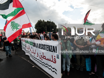 People from some Palestinian associations in Italy participate in a national pro-Palestine demonstration in Rome, Italy, on October 5, 2024,...