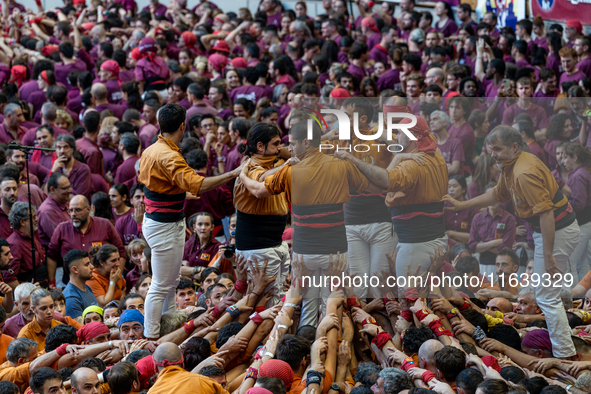 Members of Sagals d'Osona participate in the Concurs de Castells competition in Tarragona, Spain, on October 5, 2024. 