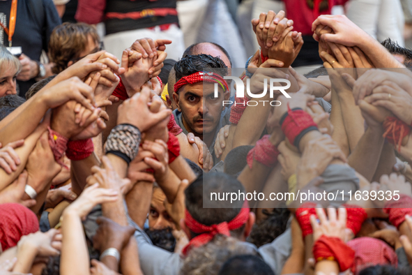 Members of Tirallongues de Manresa participate in the Concurs de Castells competition in Tarragona, Spain, on October 5, 2024. 