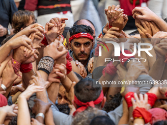 Members of Tirallongues de Manresa participate in the Concurs de Castells competition in Tarragona, Spain, on October 5, 2024. (