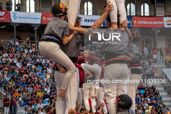 Members of Tirallongues de Manresa participate in the Concurs de Castells competition in Tarragona, Spain, on October 5, 2024. 