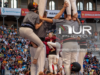 Members of Tirallongues de Manresa participate in the Concurs de Castells competition in Tarragona, Spain, on October 5, 2024. (