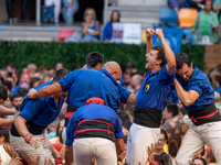 Castellers de Berga celebrates a human castle during the Concurs de Castells competition in Tarragona, Spain, on October 5, 2024. (