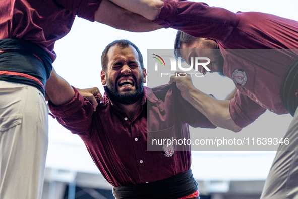 Colla Castellera Jove de Barcelona participates in the Concurs de Castells competition in Tarragona, Spain, on October 5, 2024. 