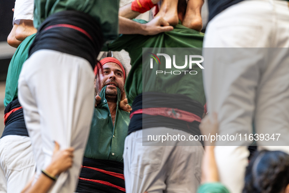 Castellers de Sant Cugat participate in the Concurs de Castells competition in Tarragona, Spain, on October 5, 2024. 