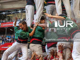 Castellers de Sant Cugat participate in the Concurs de Castells competition in Tarragona, Spain, on October 5, 2024. (