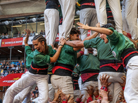 Castellers de Sant Cugat participate in the Concurs de Castells competition in Tarragona, Spain, on October 5, 2024. (