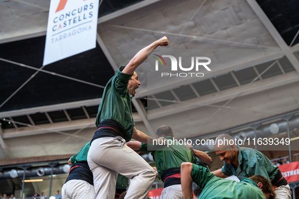 Castellers de Sant Cugat participate in the Concurs de Castells competition in Tarragona, Spain, on October 5, 2024. 