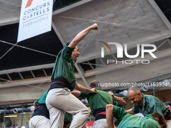 Castellers de Sant Cugat participate in the Concurs de Castells competition in Tarragona, Spain, on October 5, 2024. (