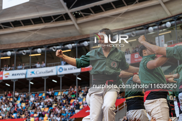 Castellers de Sant Cugat participate in the Concurs de Castells competition in Tarragona, Spain, on October 5, 2024. 