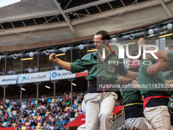 Castellers de Sant Cugat participate in the Concurs de Castells competition in Tarragona, Spain, on October 5, 2024. (