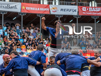 Xiquets de Serrallo participate in the Concurs de Castells competition in Tarragona, Spain, on October 5, 2024. (