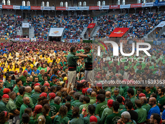 Castellers de Sant Cugat participate in the Concurs de Castells competition in Tarragona, Spain, on October 5, 2024. (