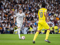 Federico Valverde of Real Madrid CF is in action with the ball during the La Liga EA Sports 2024/25 football match between Real Madrid CF an...