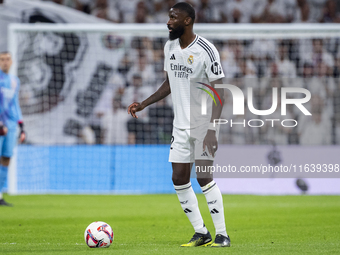 Antonio Rudiger of Real Madrid CF is in action with the ball during the La Liga EA Sports 2024/25 football match between Real Madrid CF and...