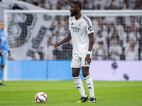 Antonio Rudiger of Real Madrid CF is in action with the ball during the La Liga EA Sports 2024/25 football match between Real Madrid CF and...