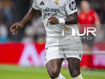 Vinicius Junior of Real Madrid CF is in action with the ball during the La Liga EA Sports 2024/25 football match between Real Madrid CF and...